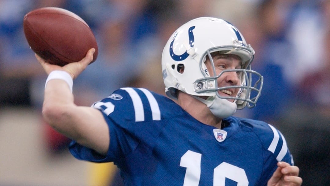 Indianapolis Colts quarterback Peyton Manning passes against the Tennessee Titans in Indianapolis., Sunday, Dec. 5, 2004. Manning was selected as The Associated Press Offensive Player of the Year Wednesday Jan. 5, 2005.