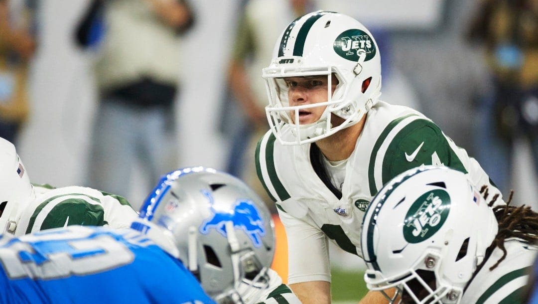 New York Jets quarterback Sam Darnold (14) gets set to run a play against the Detroit Lions during an NFL football game at Ford Field in Detroit, Monday, Sept. 10, 2018.