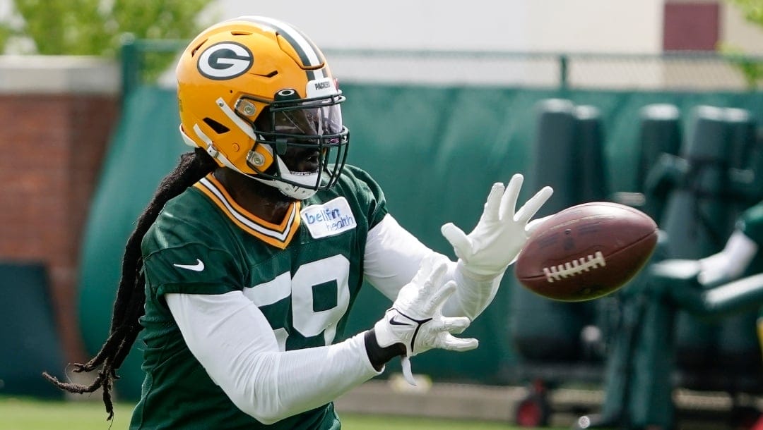 Green Bay Packers' De'Vondre Campbell runs a drill at the NFL football team's practice field training camp Tuesday, May 31, 2022, in Green Bay, Wis. (AP Photo/Morry Gash)