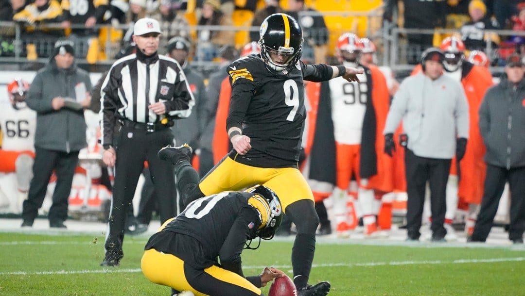 Pittsburgh Steelers kicker Chris Boswell (9) kicks a field goal from the hold of Corlis Waitman during the second half an NFL football game against the Cleveland Browns, Monday, Jan. 3, 2022, in Pittsburgh. (