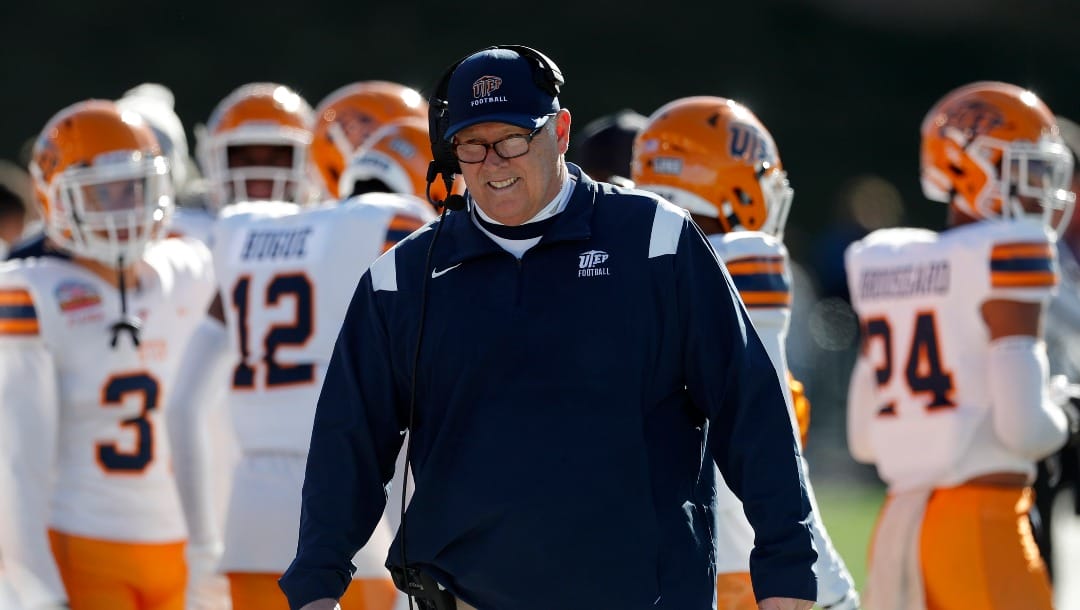 UTEP coach Dana Dimel reacts during a time out during the first half of the New Mexico Bowl NCAA college football game against Fresno State Saturday, Dec. 18, 2021, in Albuquerque, N.M.