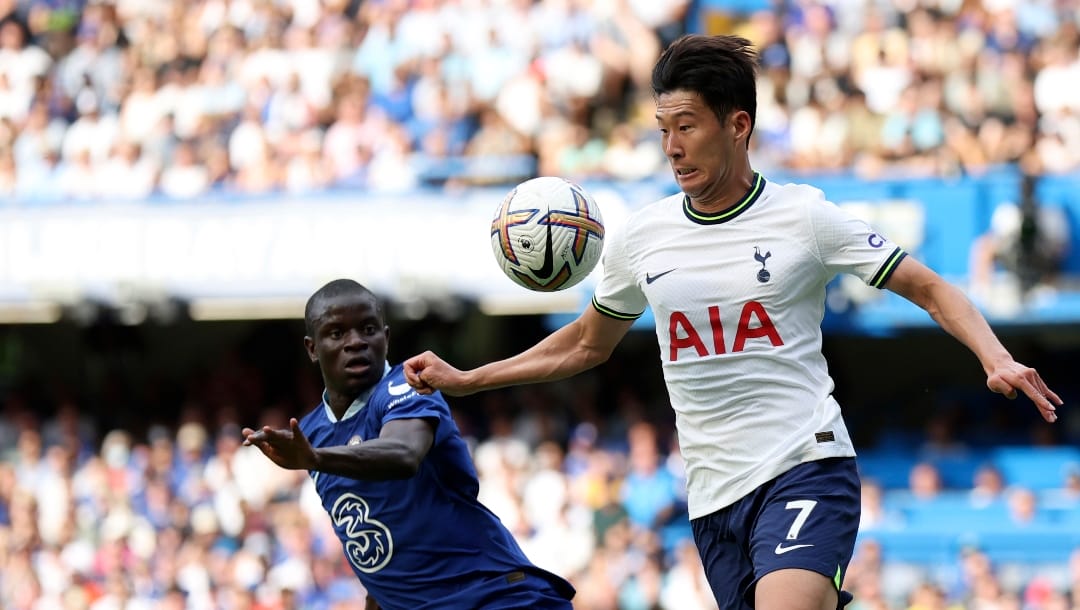 Tottenham's Son Heung-min, right, duels for the ball with Chelsea's N'Golo Kante during the English Premier League soccer match between Chelsea and Tottenham Hotspur at Stamford Bridge Stadium in London, Sunday, Aug. 14, 2022.