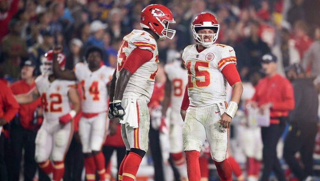 Kansas City Chiefs quarterback Patrick Mahomes celebrates with offensive guard Cameron Erving after a touchdown during the second half of an NFL football game against the Los Angeles Rams, Monday, Nov. 19, 2018, in Los Angeles. (AP Photo/Kelvin Kuo)