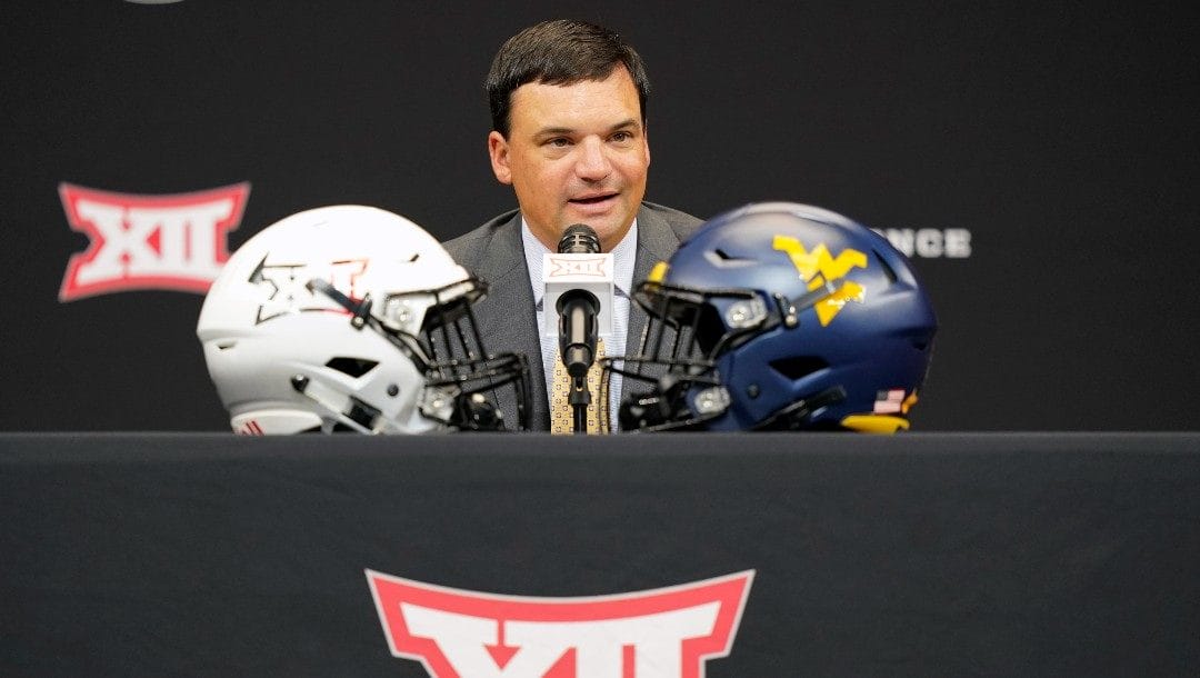 West Virginia head coach Neal Brown speaks to reporters at the NCAA college football Big 12 media days in Arlington, Texas, Wednesday, July 13, 2022.