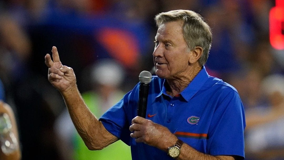 Former Florida head coach Steve Spurrier addresses fans to honor championship teams during the first half of an NCAA college football game against Tennessee, Saturday, Sept. 25, 2021, in Gainesville, Fla.