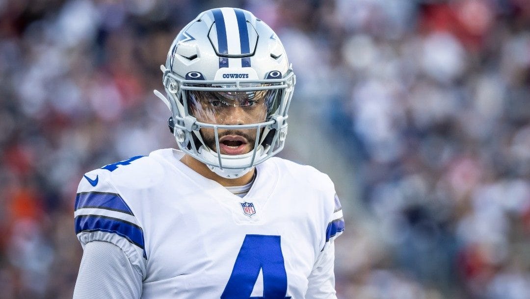 Dallas Cowboys quarterback Dak Prescott (4) focuses during the first half of an NFL football game against the New England Patriots in Foxborough, Mass., on Sunday, Oct. 17, 2021.