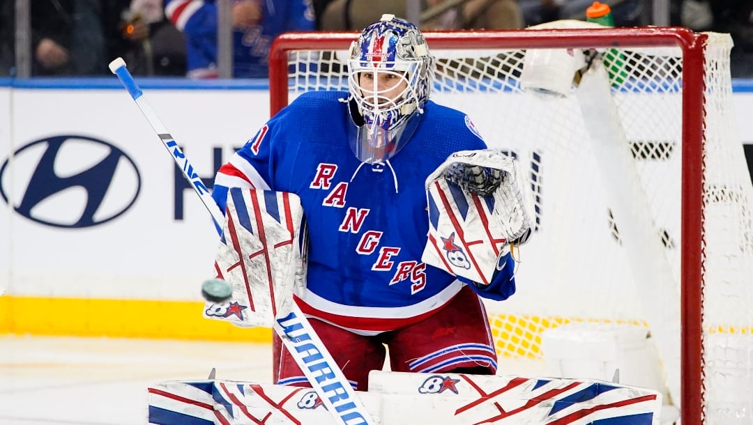 New York Rangers goaltender Igor Shesterkin (31) protects his net during the second period of an NHL hockey game against the New Jersey Devils Friday, March 4, 2022, in New York.