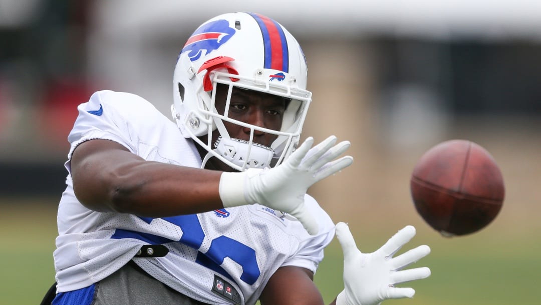 Buffalo Bills running back Devin Singletary (26) makes a catch during practice at the NFL football team's training camp in Pittsford, N.Y., Thursday, Aug. 4, 2022. (AP Photo/Joshua Bessex)
