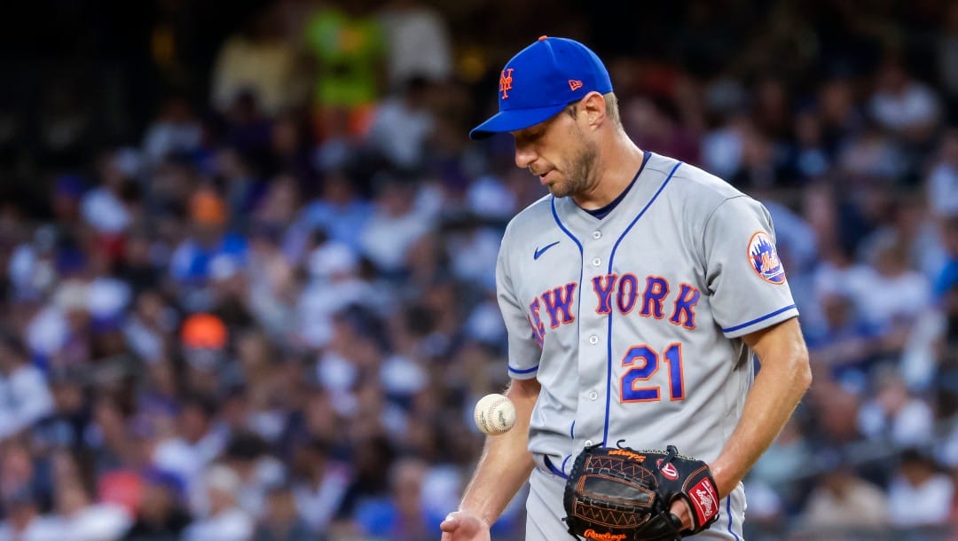 New York Mets starting pitcher Max Scherzer prepares to pitch in the first inning of a baseball game against the New York Yankees, Monday, Aug. 22, 2022, in New York. (AP Photo/Corey Sipkin)