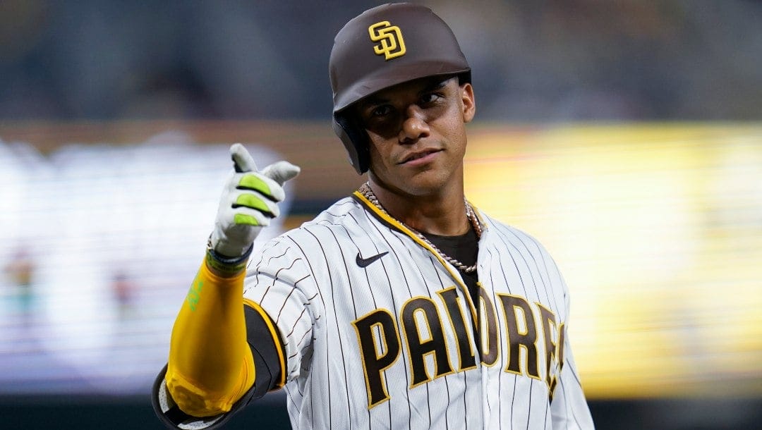 San Diego Padres' Juan Soto gestures after hitting a single against the Colorado Rockies during the eighth inning of a baseball game Wednesday, Aug. 3, 2022, in San Diego.