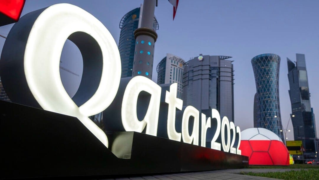 Branding is displayed near the Doha Exhibition and Convention Center where soccer World Cup draw will be held, in Doha, Qatar, on March 31, 2022.
