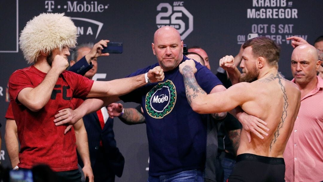 Conor McGregor, right, and Khabib Nurmagomedov face off during a ceremonial weigh-in for the UFC 229 mixed martial arts fight