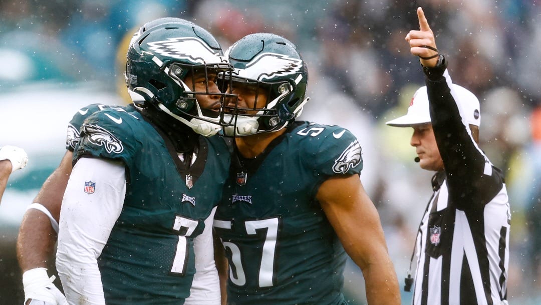Philadelphia Eagles linebackers Haason Reddick (7) and T.J. Edwards (57) against the Jacksonville Jaguars during an NFL football game, Sunday, Oct. 2, 2022, in Philadelphia. The Eagles defeated the Jaguars 29-21. (AP Photo/Rich Schultz)