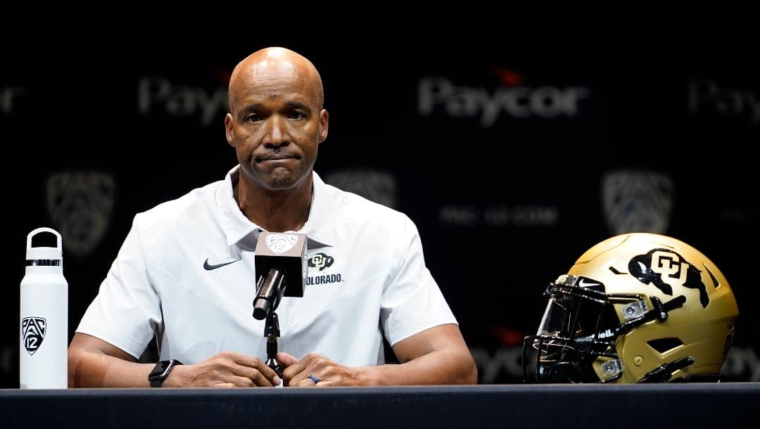 Colorado head coach Karl Dorrell speaks during Pac-12 Conference men's NCAA college football media day Friday, July 29, 2022, in Los Angeles. (AP Photo/Damian Dovarganes)