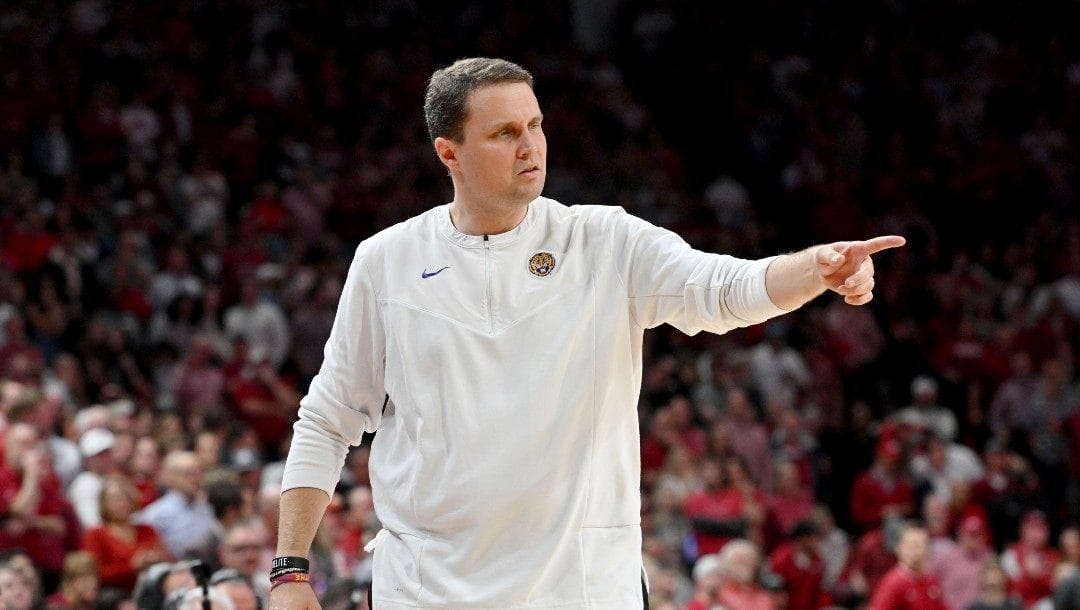 LSU coach Will Wade on the sidelines against Arkansas during the second half of an NCAA college basketball game Wednesday, March 2, 2022, in Fayetteville, Ark.