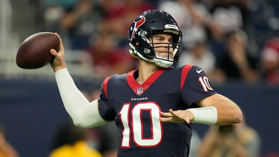 Houston Texans quarterback Davis Mills throws a pass during the first half of an NFL preseason football game against the San Francisco 49ers, Thursday, Aug. 25, 2022, in Houston.