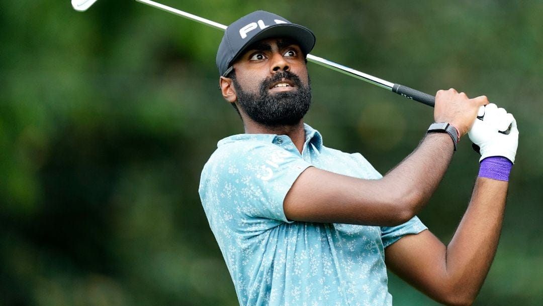 Sahith Theegala hits off the second tee during the first round of the Tour Championship golf tournament at East Lake Golf Club, Thursday, Aug. 25, 2022, in Atlanta.