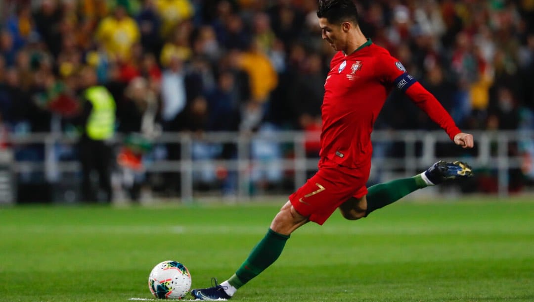 Portugal's Cristiano Ronaldo shoots a free kick.