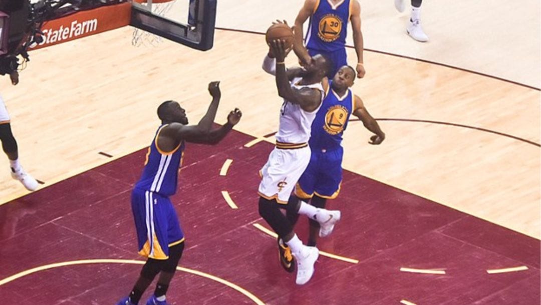 LeBron James attempts a shot against Draymond Green during the 2016 NBA Finals.