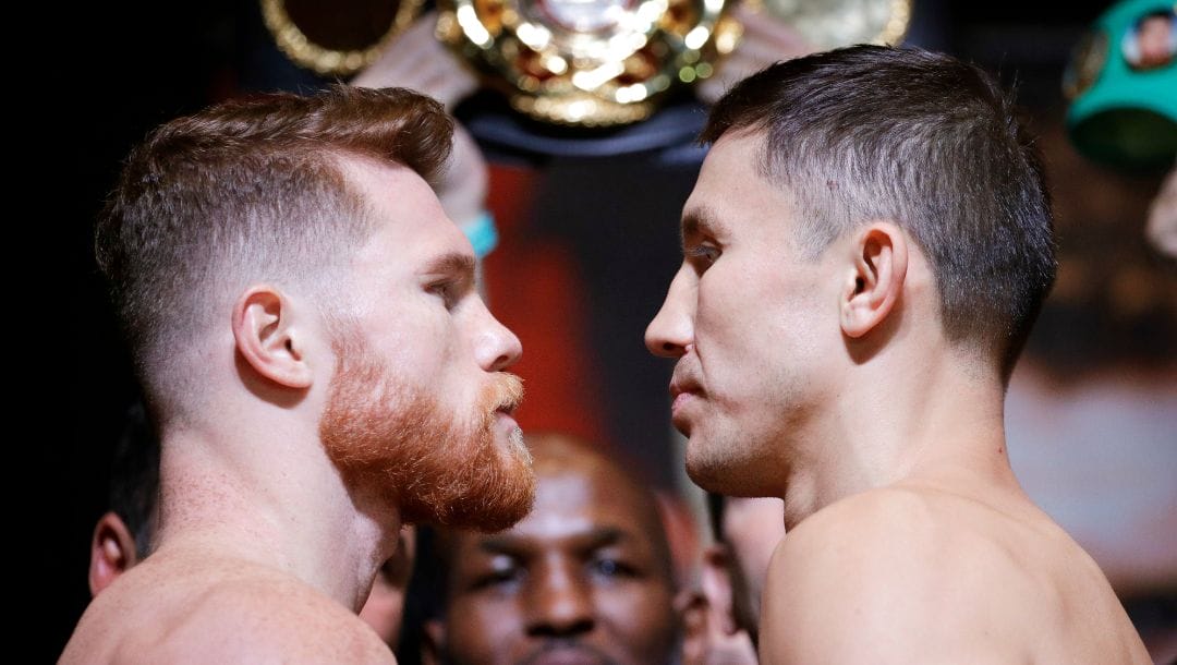 Canelo Alvarez, left, and Gennady Golovkin pose during a weigh-in Friday, Sept. 15, 2017, in Las Vegas.