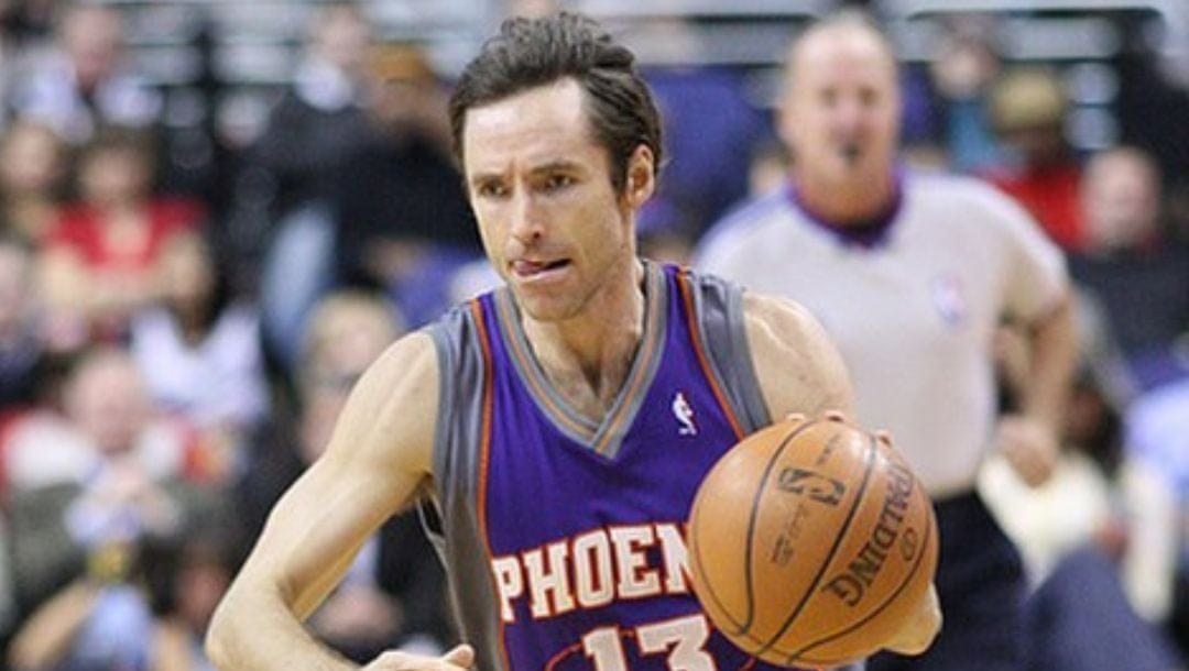 Steve Nash of the Phoenix Suns of the National Basketball Association dribbling the against the Washington Wizards.