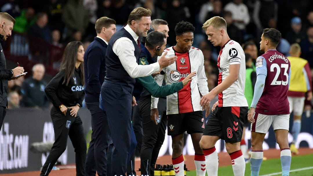 Southampton's manager Ralph Hasenhuttl talks to Southampton's James Ward-Prowse, right, during the English Premier League soccer match between Aston Villa and Southampton at Villa Park in Birmingham, England, Friday, Sept. 16, 2022.
