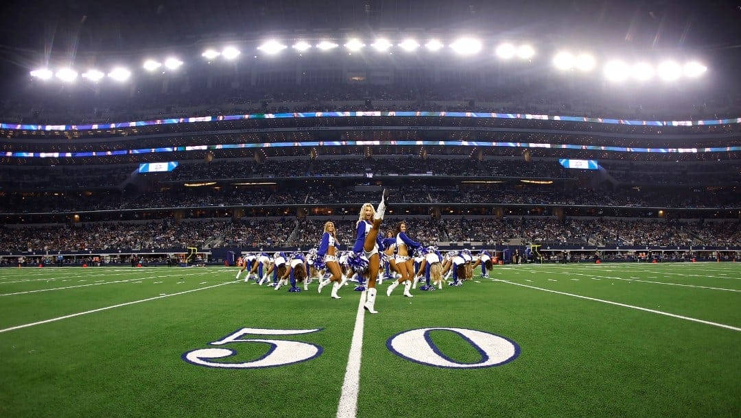 The Dallas Cowboys Cheerleaders perform at halftime of an NFL football game in Arlington, Texas, Sunday, Dec. 26, 2021. (AP Photo/Ron Jenkins)