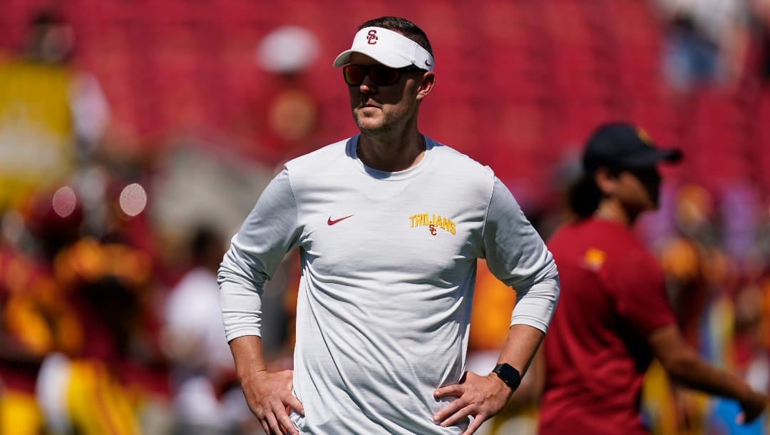 Southern California head coach Lincoln Riley stands on the field before an NCAA college football game against Rice in Los Angeles, Saturday, Sept. 3, 2022. (AP Photo/Ashley Landis)
