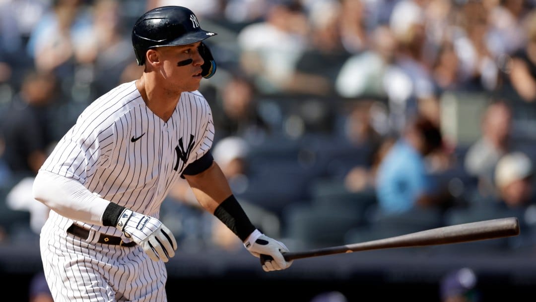 New York Yankees' Aaron Judge hits a single during the sixth inning of the team's baseball game against the Tampa Bay Rays on Saturday, Sept. 10, 2022, in New York.
