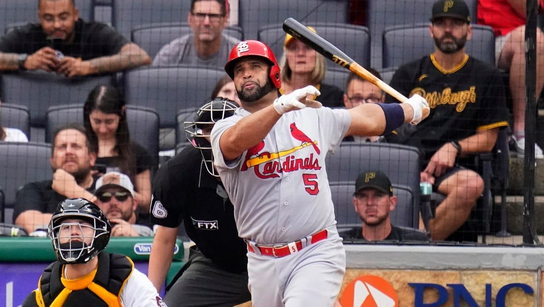 St. Louis Cardinals' Albert Pujols (5) watches his 697th career home run, a two-run home run off Pittsburgh Pirates relief pitcher Chase De Jong, during the ninth inning of a baseball game in Pittsburgh, Sunday, Sept. 11, 2022.