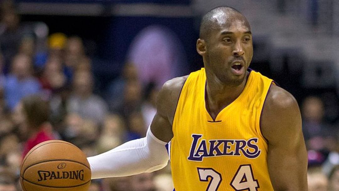 Kobe Bryant of the Los Angeles Lakers looks to drive past his defender in a game against the Washington Wizards in 2014.