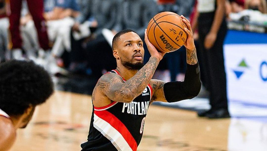 Damian Lillard shooting a free throw in an NBA game against the Cavaliers in November 2021.