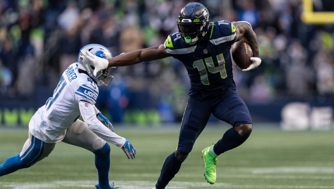 Seattle Seahawks wide receiver DK Metcalf runs with the ball