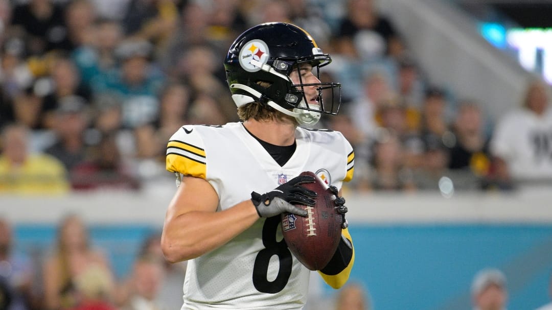 Pittsburgh Steelers quarterback Kenny Pickett (8) looks for a receiver