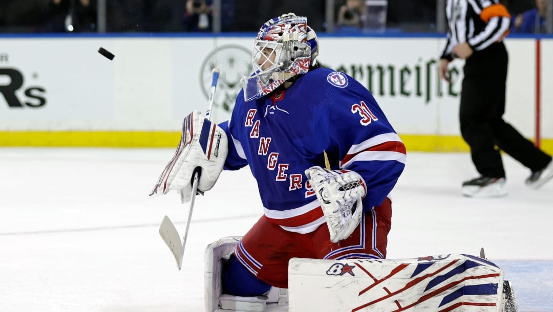 New York Rangers goaltender Igor Shesterkin (31) makes a save against the Columbus Blue Jackets in the third period of an NHL hockey game Friday, Oct. 29, 2021, in New York. The Rangers won 4-0.