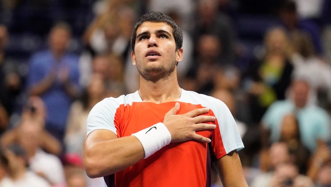 Carlos Alcaraz, of Spain, reacts to the crowd after defeating Frances Tiafoe, of the United States, during the semifinals of the U.S. Open tennis championships, Friday, Sept. 9, 2022, in New York.