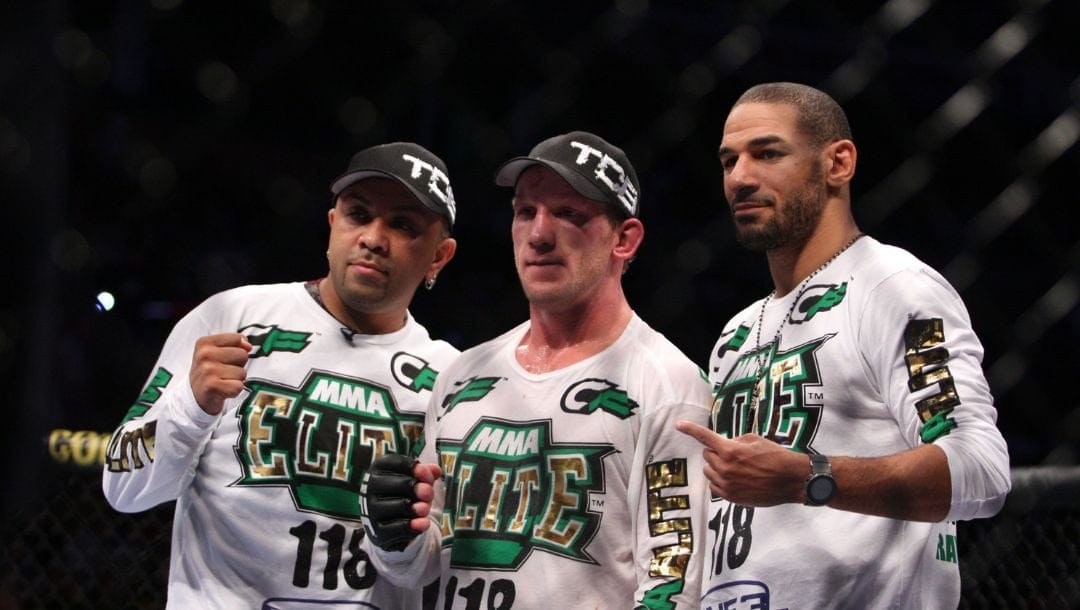 Gray Maynard, center, celebrates his win over Kenny Florian after their UFC fight at the TD Garden on Saturday, August 28, 2010.