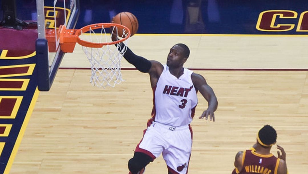 Dwayne Wade shoots a layup against the Cleveland Cavaliers during the 2015-2016 season.