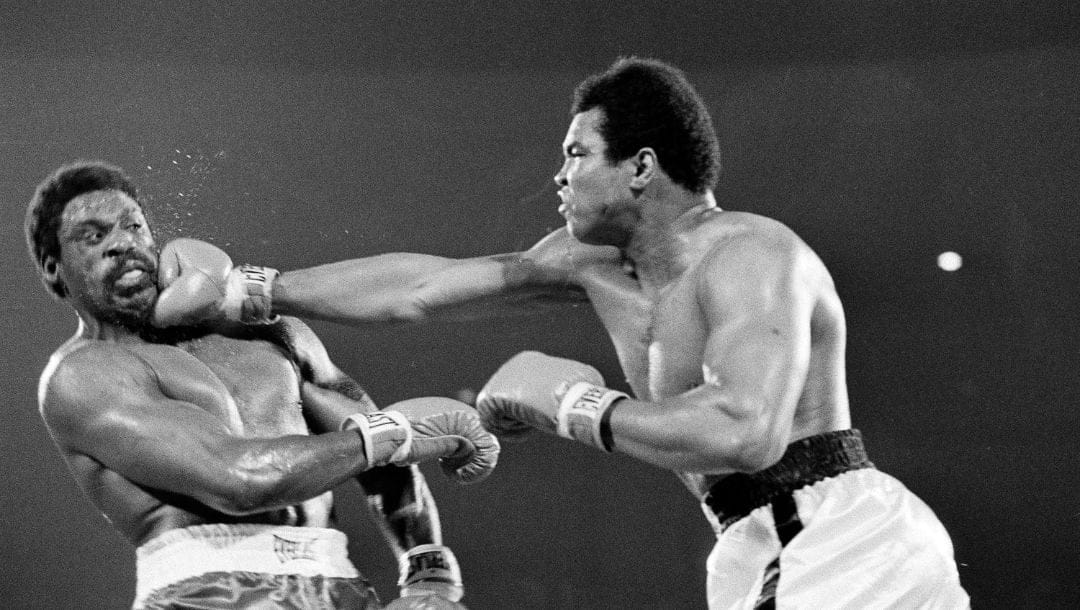 Muhammad Ali hits Ron Lyle with a hard right to the chin during fifth round action of the title bout in Las Vegas, May 16, 1975.