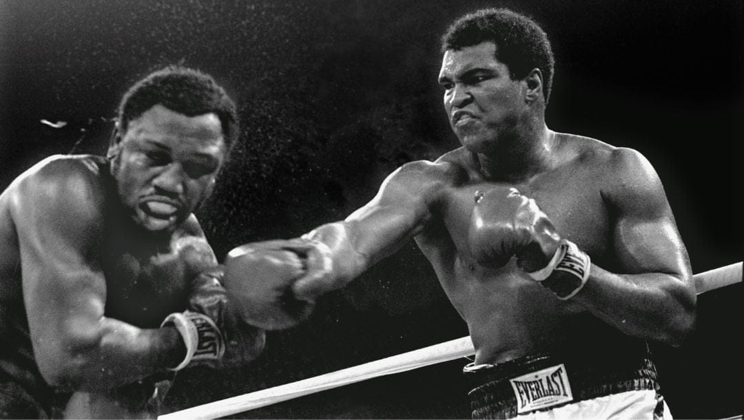 In this Oct. 1, 1975 file photo, Heavyweight champion Muhammad Ali connects with a right against challenger Joe Frazier.