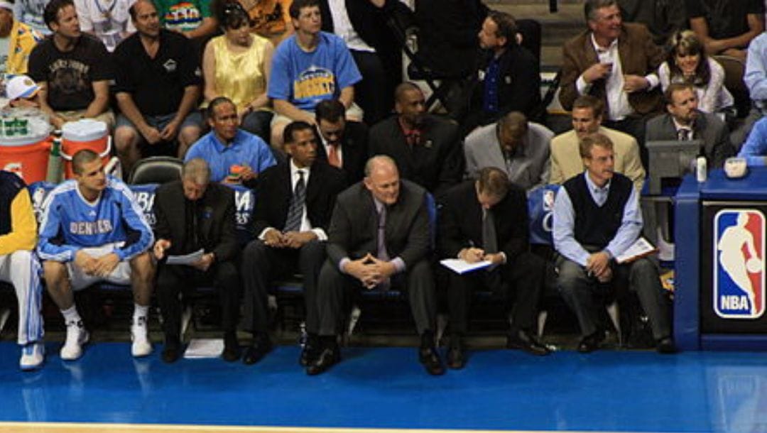 George Karl watches his Denver Nuggets team on the sidelines in 2009.