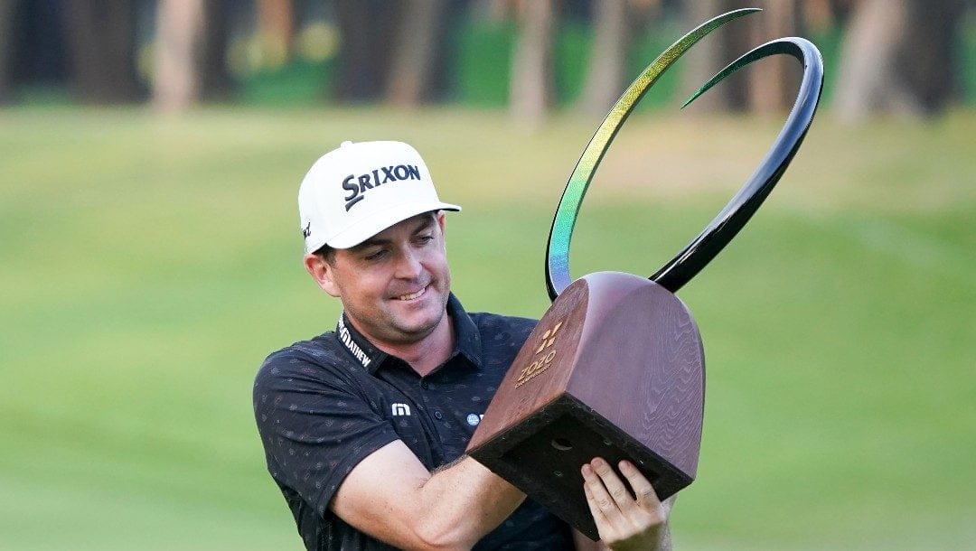 Keegan Bradley of the United States holds his trophy after winning the final round of the Zozo Championship golf tournament at Accordia Golf Narashino Country Club on Sunday, Oct. 16, 2022, in Inzai, Chiba Prefecture, east of Tokyo, Japan.