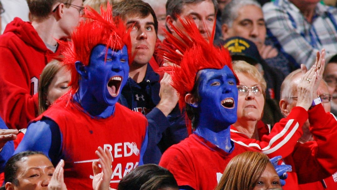 Dayton fans cheer during the first half of a second-round game against Ohio State in the NCAA college basketball tournament in Buffalo, N.Y., Thursday, March 20, 2014.
