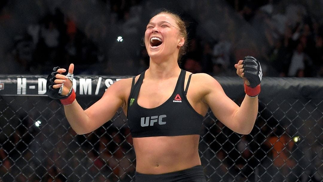 Ronda Rousey celebrates after defeating Cat Zingano in a UFC 184 mixed martial arts bantamweight title bout in Los Angeles.