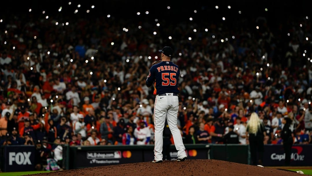 Houston Astros relief pitcher Ryan Pressly works during the ninth inning in Game 2 of baseball's World Series between the Houston Astros and the Philadelphia Phillies on Saturday, Oct. 29, 2022, in Houston.