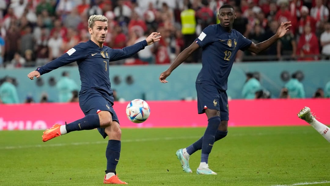 France's Antoine Griezmann kicks the ball to score his side opening goal that was later disallowed during the World Cup group D soccer match between Tunisia and France at the Education City Stadium in Al Rayyan , Qatar, Wednesday, Nov. 30, 2022. (AP Photo/Christophe Ena)