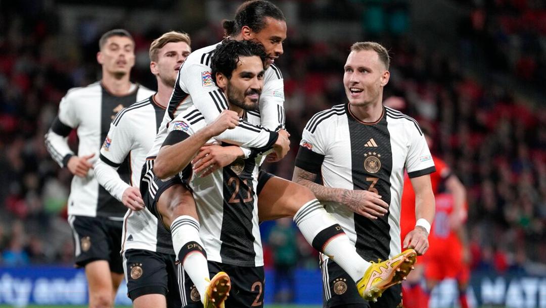 Germany's Ilkay Gundogan celebrates with his teammates after scoring his side's first goal