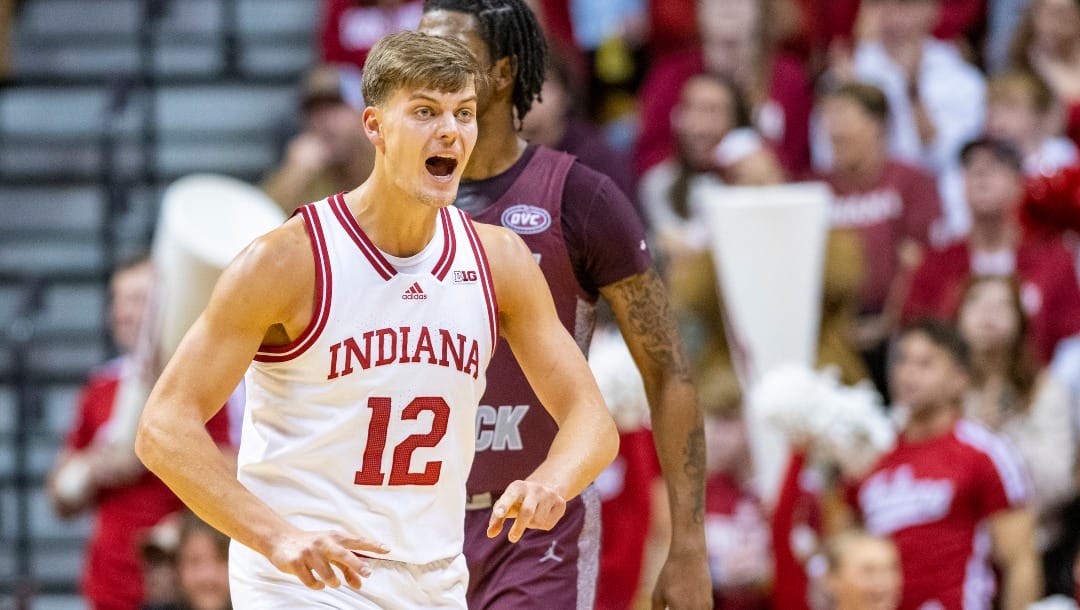 Indiana forward Miller Kopp (12) reacts during an NCAA college basketball game against Arkansas Little Rock, Wednesday, Nov. 23, 2022, in Bloomington, Ind. (AP Photo/Doug McSchooler) Indiana forward Miller Kopp (12) reacts during an NCAA college basketball game against Arkansas Little Rock, Wednesday, Nov. 23, 2022, in Bloomington, Ind. (AP Photo/Doug McSchooler)