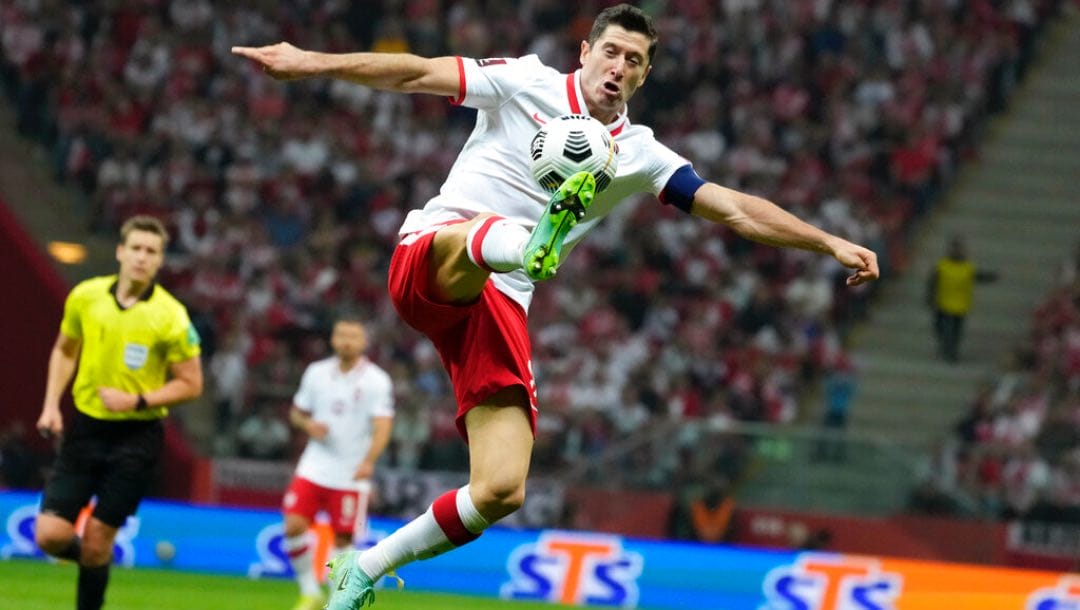 Poland's Robert Lewandowski controls the ball.