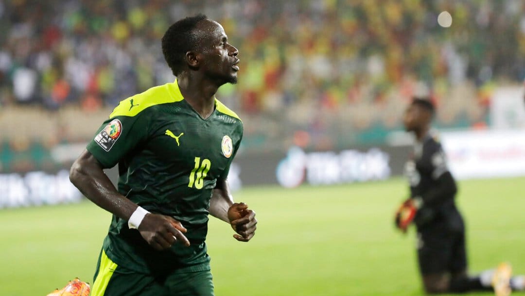Senegal's Sadio Mane celebrates after scoring his side's third goal during the African Cup of Nations 2022 semi-final soccer match between Burkina Faso and Senegal at the Ahmadou Ahidjo stadium in Yaounde, Cameroon, Wednesday, Feb. 2, 2022.